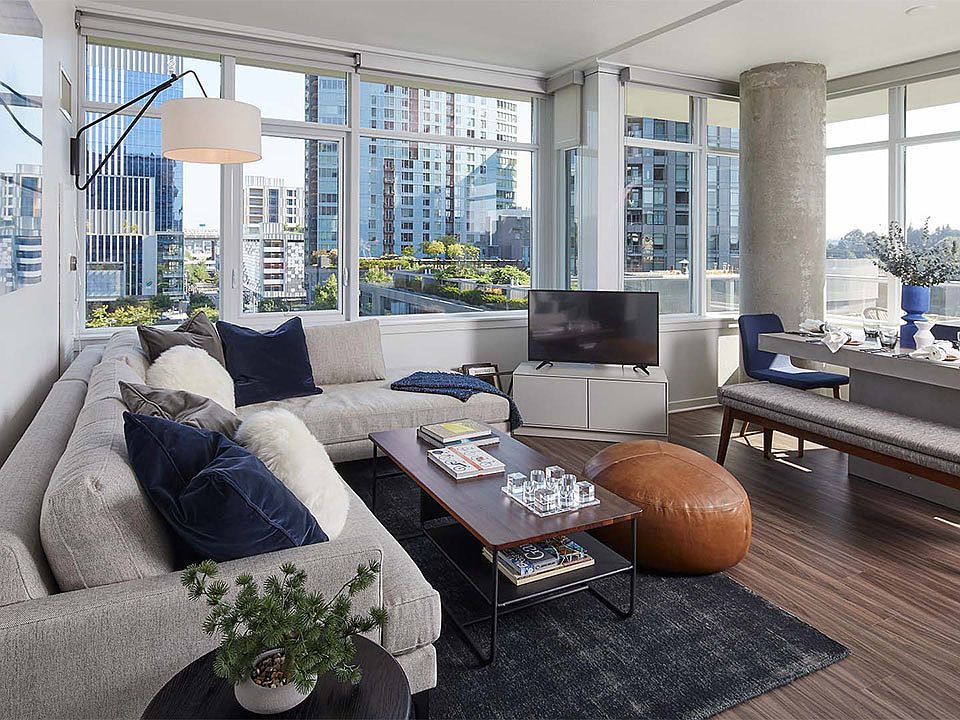 Apartment living room with wood-style flooring.