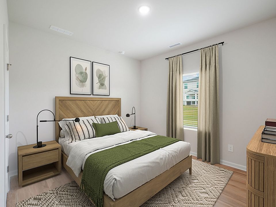 Secondary bedroom in the Paisley floorplan at a Meritage Homes community in Garner, NC.