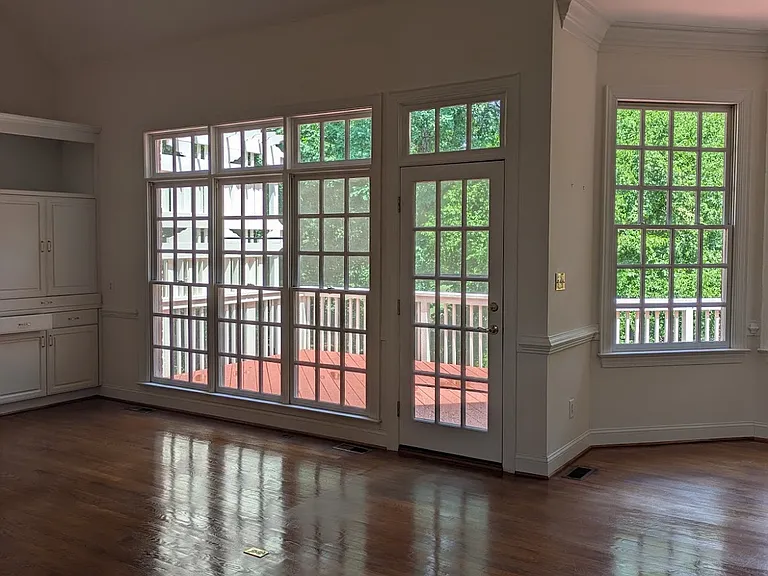 View into family/living room also facing the deck.