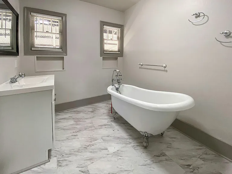 Enjoy a nice soak after a long day on the go in a stunning old school Victorian tub!