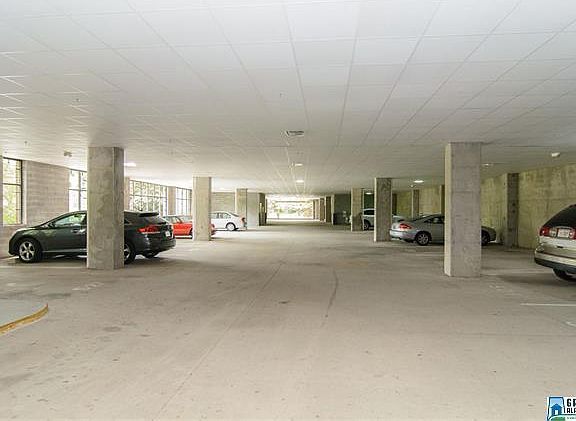 Covered, gated secure parking (1 spot), also numerous spots 