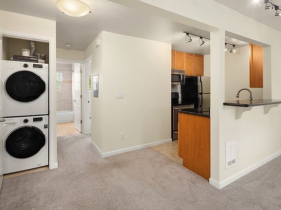 near entrance, looking at W/S (fairly new), down bathroom/bedroom hall and at kitchen