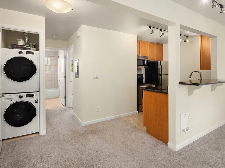 near entrance, looking at W/S (fairly new), down bathroom/bedroom hall and at kitchen