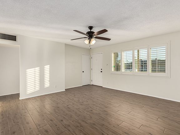 Wood looking tile floors in all common areas. Living Room area.