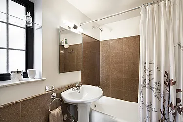 Sold by John J. Grogan & Associates