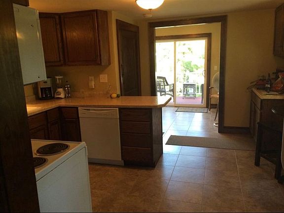 Kitchen and dining room with balcony