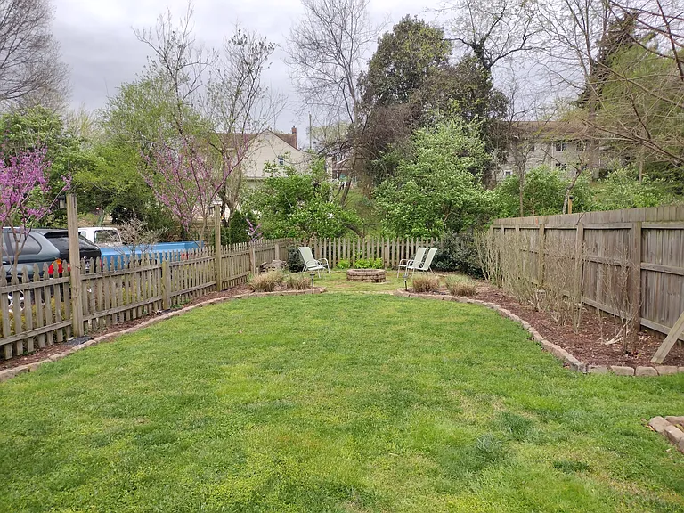 fenced yard and fire pit