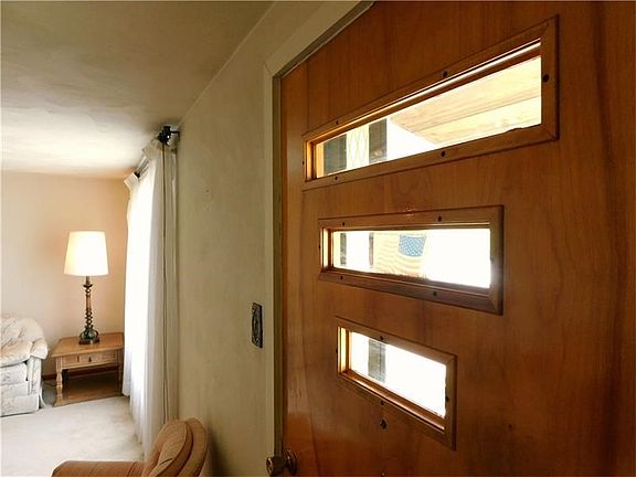 There are two of these mid century modern exterior doors, in lovely shape!