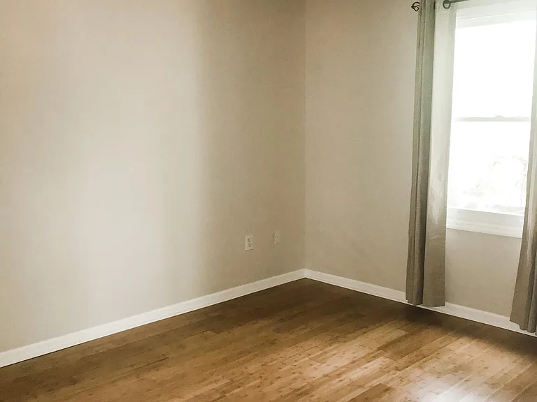 Master bedroom which has its own bathroom.