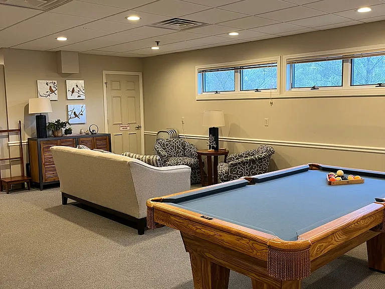Billiard table and more seating area to gather with friends.