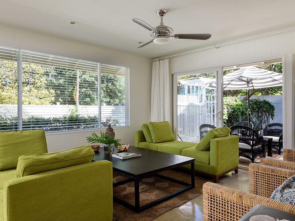 Living room with patio. Outdoor shower, private fenced yard