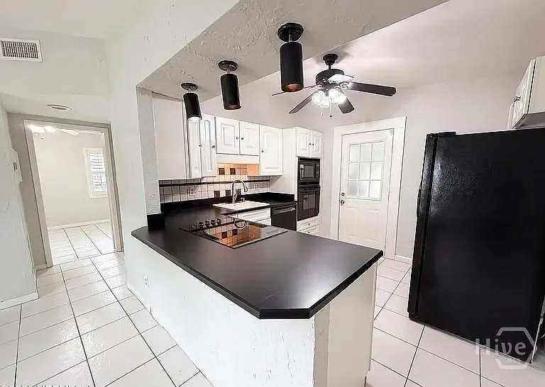 5655 Kimbrell Dr S — Photo 10