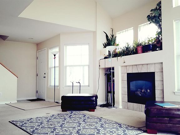 Vaulted living room with fireplace
