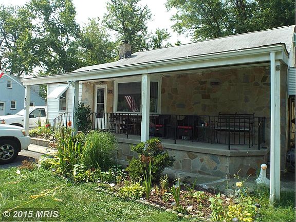 Stone front with full covered porch