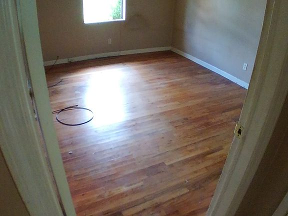 Bedrom has hardwood floors