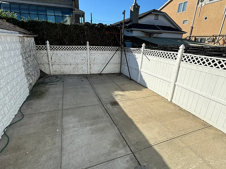 E 12th St — Photo 9