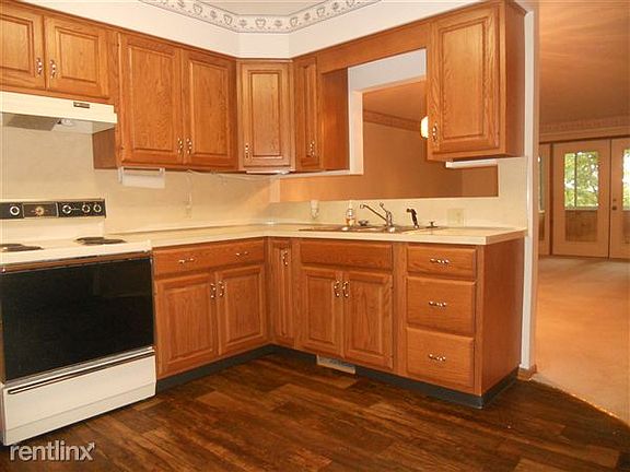 Another view of kitchen - lots of cabinets