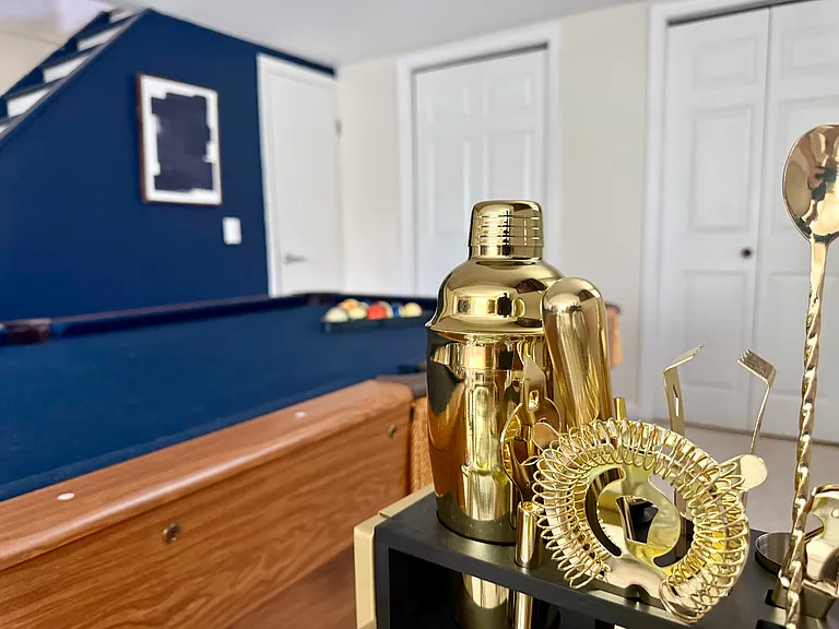Game room with pool table, dart board, and rolling bar cart with cocktail kit _ entertainment included, no extra fee