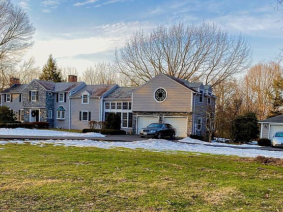 Front With third car garage 