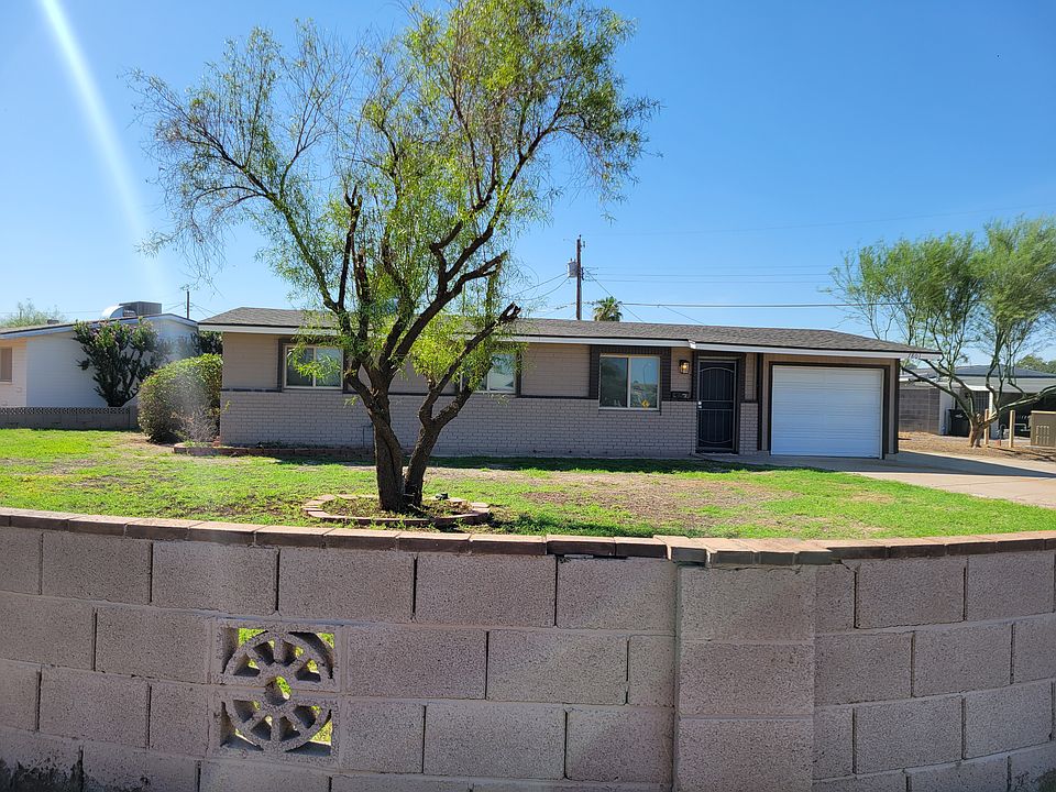 Front of the home with large corner lot