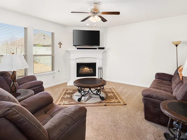 The pictures were taken while the home was occupied. None of the furniture is included with the home.