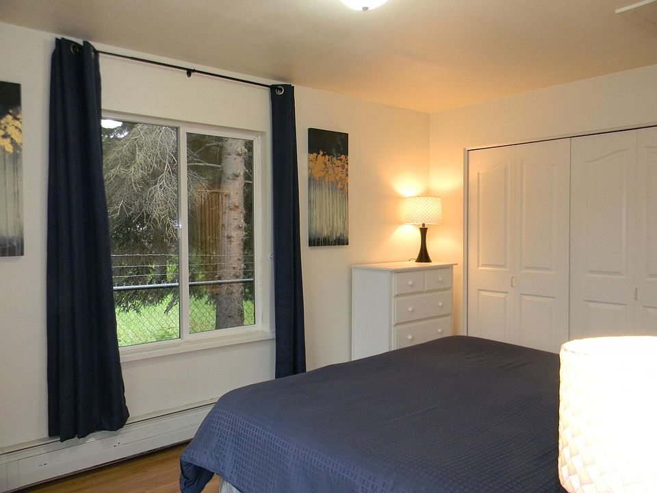 Bedroom with king bed and attached full bath