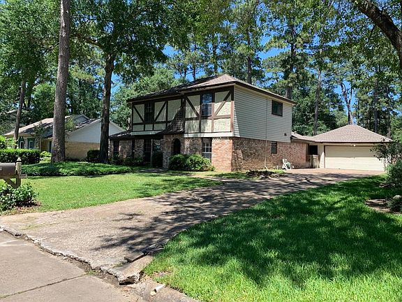 Front View with detached garage view