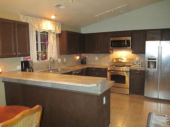 Stainless Steel Appliances, and marble counter tops