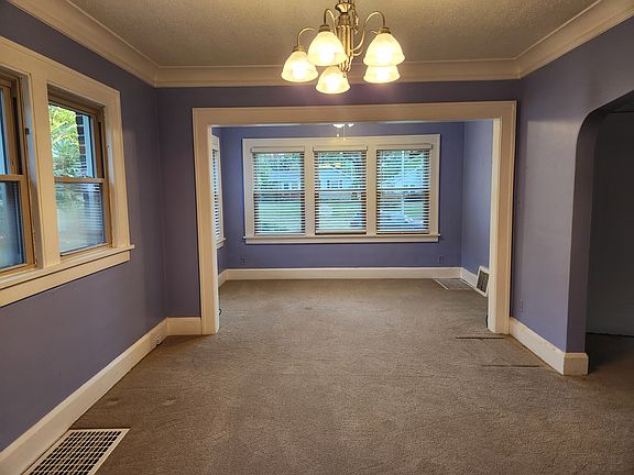 Dining room looking into sunroom