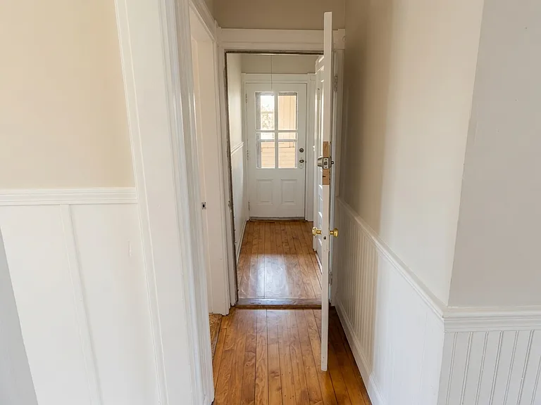 Rear Exit to Broom Closet, Extra Storage Space and Yard.