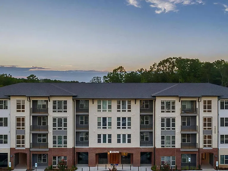 Evening View of Broadstone Trailside's Contemporary Architecture and Leasing Entrance