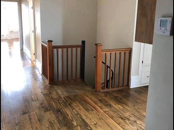 Stairs leading to basement/garage