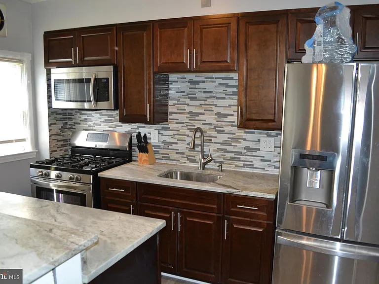 5153 Frederick Ave — Photo 9