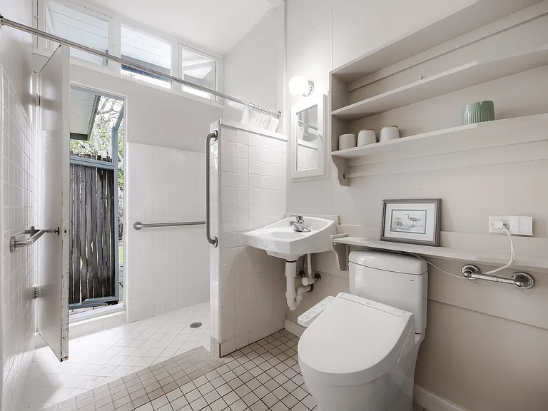Bathroom in main bedroom suite has walk-in shower