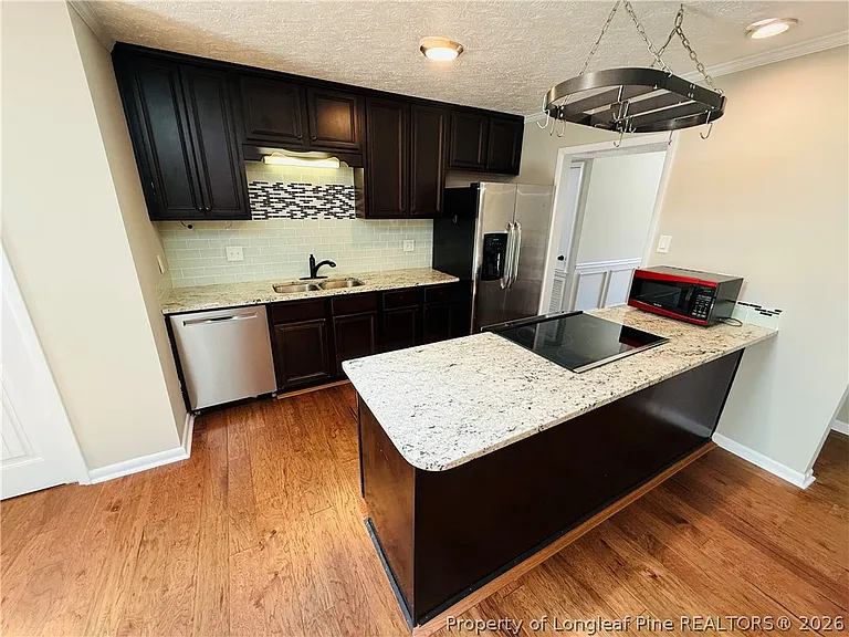 6927 Wickersham Dr — Photo 4