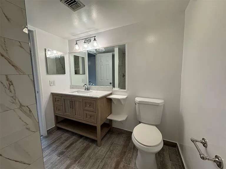 606 Gardens Dr — Photo 12