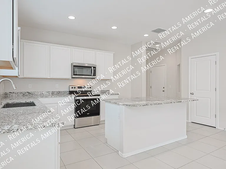 10338 W Wier Ave — Photo 6