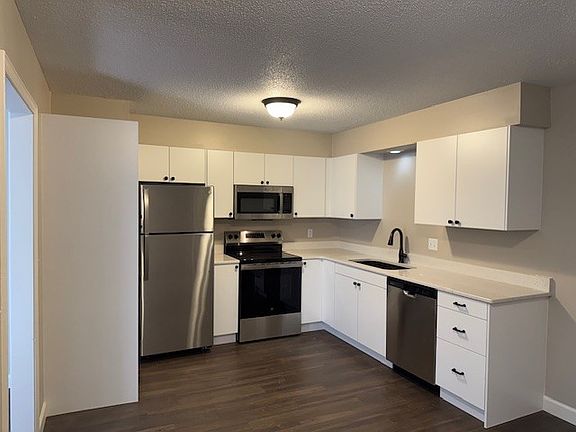 All new cabinets, counters, and appliances