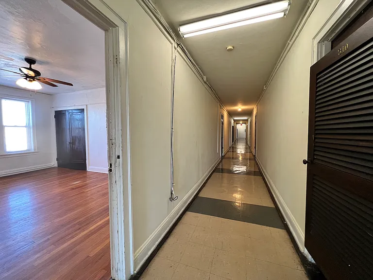 Looking down hallway from apartment.