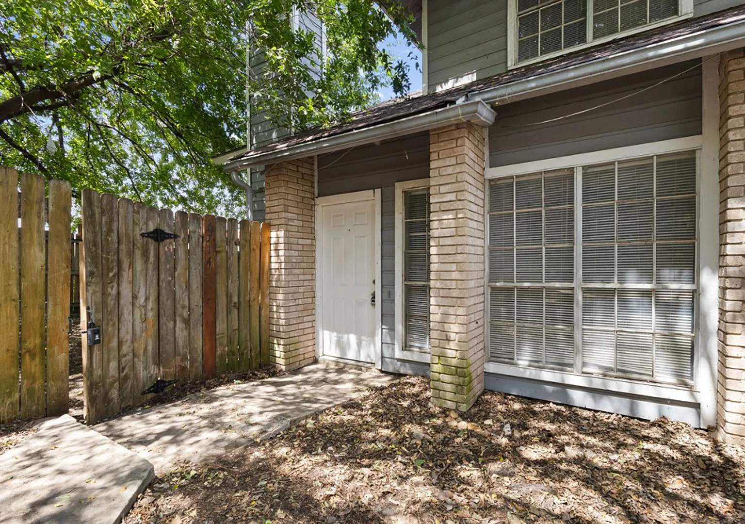 Spacious 3-Bedroom Fourplex with Private Backyard Water & Lawn Service Included — Photo 1