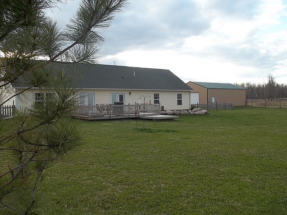 Fenced back yard w/deck