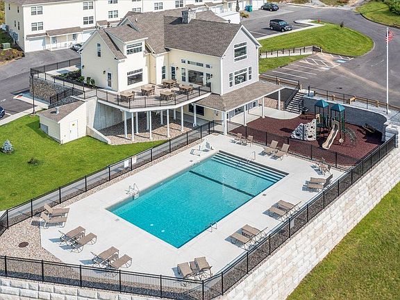 Pool, fitness center and clubhouse.