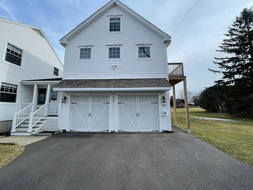 Front of house- landlord to the left, tenant entrance to the right