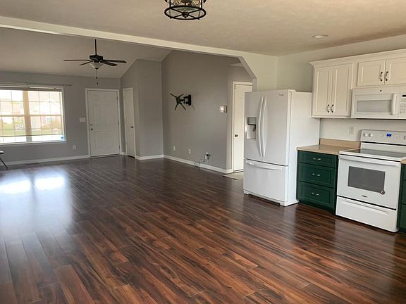 living area with wall mount TV bracket