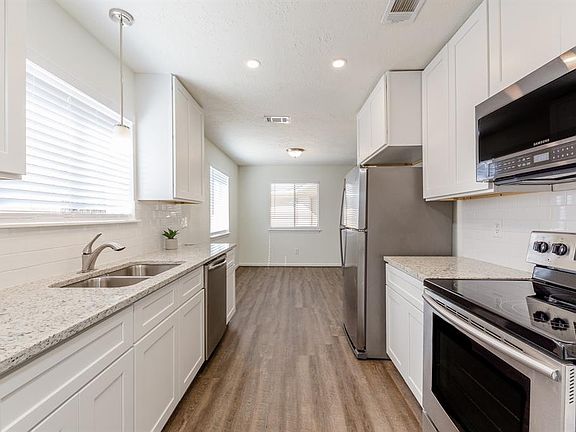 Remodeled kitchen with 42" tall new cabinets.