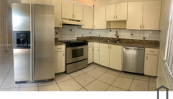 551 NW 46th St #0 — Photo 1