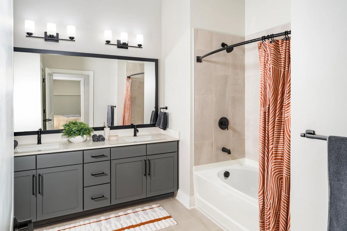 Sophisticated bathrooms at Modera Liberty Row feature dual vanities, sleek finishes, and spacious layouts designed for comfort in Charlotte.