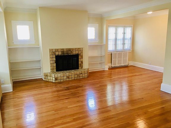 Living-Dining Combo! Newly refinished hardwood floors.