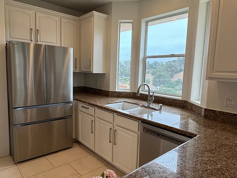 Brand New LG French door Refrigerator, New Kitchen Faucet, Granite Counter tops