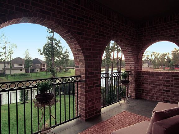 Sunset views from second floor terrace overlooking the lake.